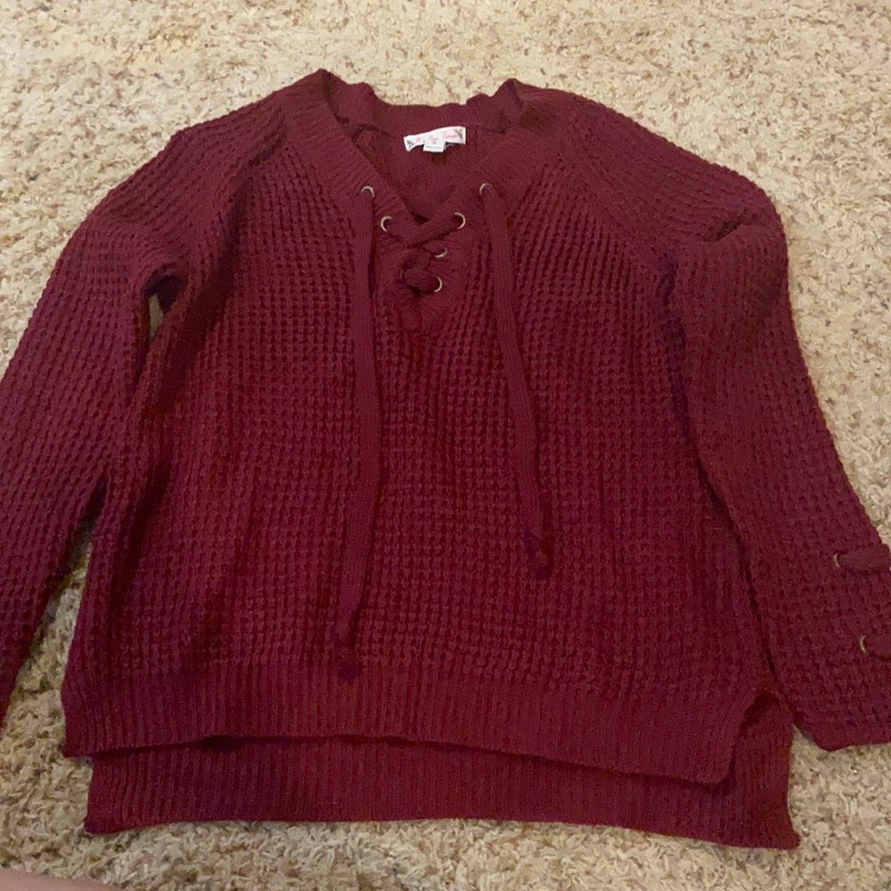 Burgundy Women’s knit sweater .